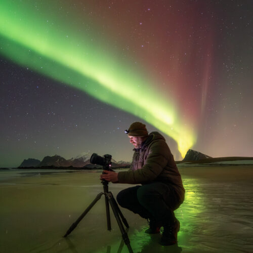 Photographer and aurora